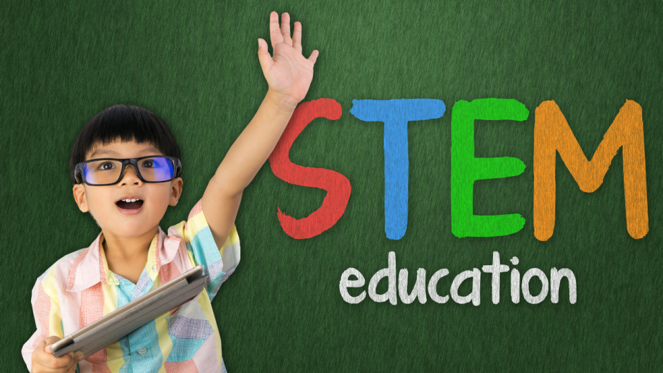 Boy with hand raised next to text reading "STEM education"